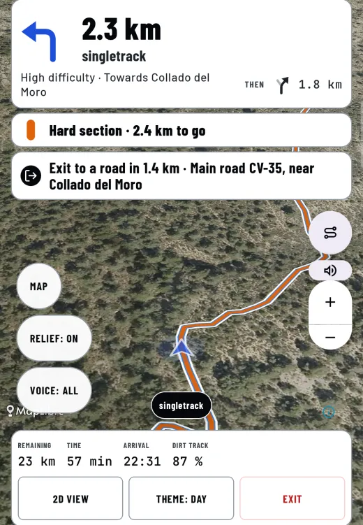 The Corally app navigator on a phone, tilted view over satellite: a high-difficulty singletrack in orange, "Hard section · 2.4 km to go" and the nearest road exit.